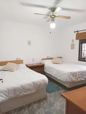Cama o camas de una habitación en Casa Rural en Padules GR