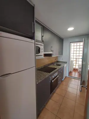 Una cocina o zona de cocina en Ático con piscina en Vera a 5 minutos de la playa