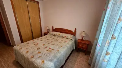 Cama o camas de una habitación en Apartamento de 2 dormitorios en Veramar 5 Primera Linea de Playa