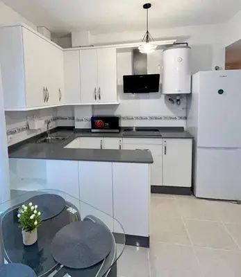 Una cocina o zona de cocina en Newly renovated apartment