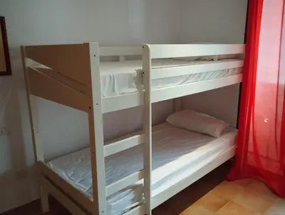 Cama o camas de una habitación en Macenas apartamento perfecto para familias