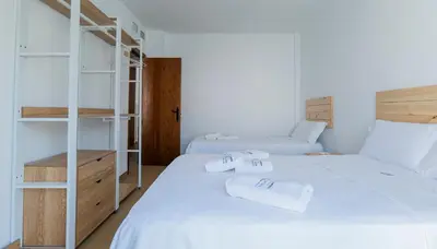 Cama o camas de una habitación en La Mimosa del Cabo