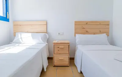 Cama o camas de una habitación en La Mimosa del Cabo