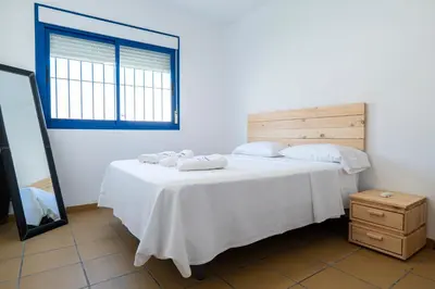 Cama o camas de una habitación en La Mimosa del Cabo