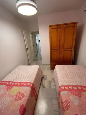 Cama o camas de una habitación en Apartamento a un paso de la playa