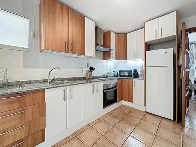 Una cocina o zona de cocina en VVR Bajo 3 Dormitorios con Jardin y Piscinas