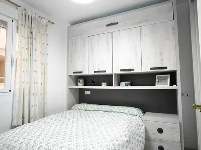 Cama o camas de una habitación en BS Apartamento Buenavista Playa estancia min 6 noches A 2 minutos de la playa