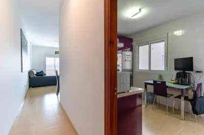 Una televisión o centro de entretenimiento en Apartamento Aire Mediterráneo R&R