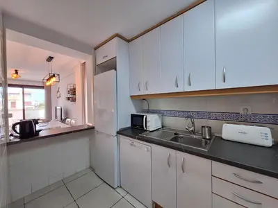 Una cocina o zona de cocina en Jardines de Nuevo Vera - Junto al mar