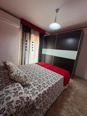 Cama o camas de una habitación en Orilla playa Balerma