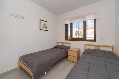 Cama o camas de una habitación en La Isla