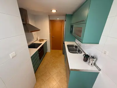 Una cocina o zona de cocina en Ático Roquetas
