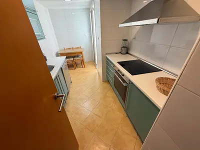 Una cocina o zona de cocina en Ático Roquetas