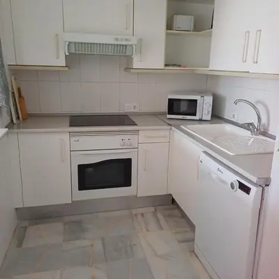 Una cocina o zona de cocina en Sunny apartment in Mojácar with sea views