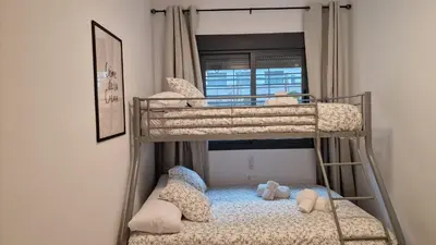 Cama o camas de una habitación en Gran terraza Apartamento playa Garrucha