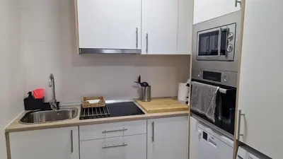 Una cocina o zona de cocina en Gran terraza Apartamento playa Garrucha