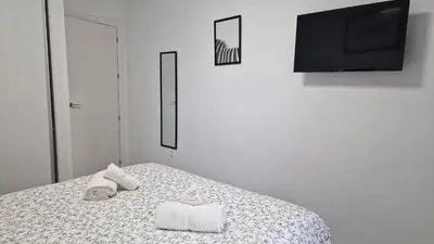 Cama o camas de una habitación en Gran terraza Apartamento playa Garrucha
