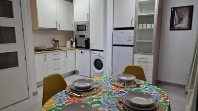 Una cocina o zona de cocina en Gran terraza Apartamento playa Garrucha