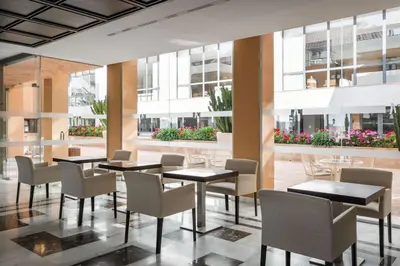 Un restaurante o sitio para comer en The Place Palacio Mojacar & Spa by ALEGRIA Adults Only