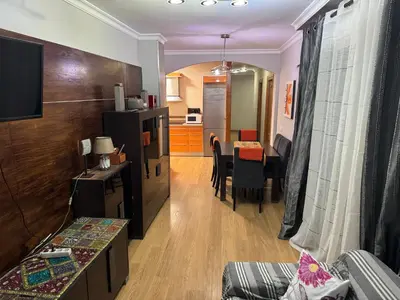 Zona de estar de piso avda sabinal con piscina