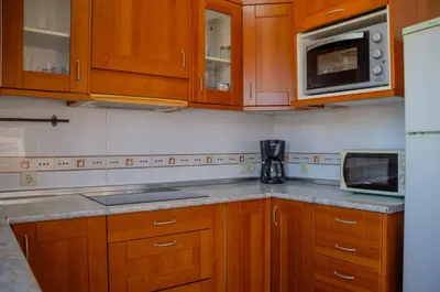 Una cocina o zona de cocina en Trendy Homes Brisamarina Roquetas de Mar