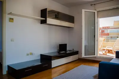 Una televisión o centro de entretenimiento en Trendy Homes Brisamarina Roquetas de Mar