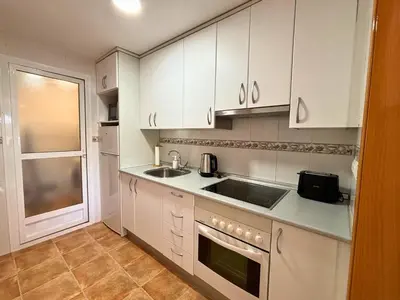 Una cocina o zona de cocina en Horizon Plaza Colon 7