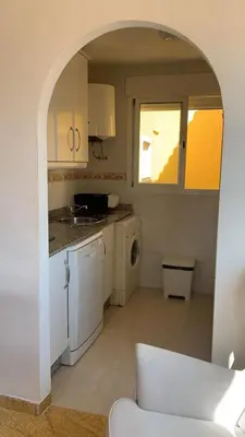Una cocina o zona de cocina en NIASOL Golf Apartment