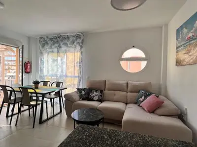 Zona de estar de Casa de Federico con vistas al mar en Vera Playa