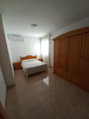 Cama o camas de una habitación en Apartamento Villaricos con parking