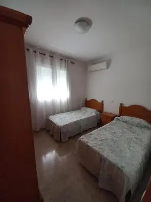 Cama o camas de una habitación en Apartamento Villaricos con parking