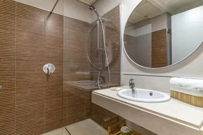 Un baño de Apartamento a Estrenar Piscina y Parking Gratis