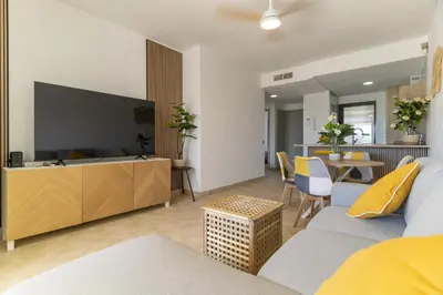 Una televisión o centro de entretenimiento en Apartamento a Estrenar Piscina y Parking Gratis