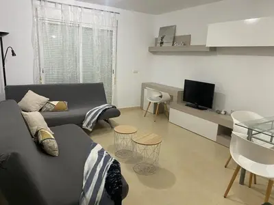 Una televisión o centro de entretenimiento en Apartamento estilo nordico Lagos de Almerimar