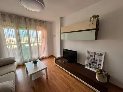 Una televisión o centro de entretenimiento en Apartamento Aguadulce Playa Torrequebrada