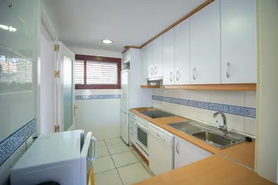 Una cocina o zona de cocina en Mediterranea 17 Vera Playa Jardines de nuevo Vera
