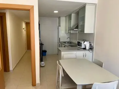 Una cocina o zona de cocina en apartamento piscina privada