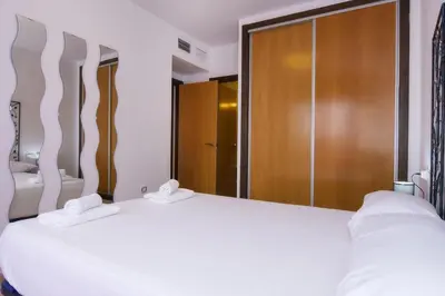 Cama o camas de una habitación en Águilas Excelente Alojamiento Collados Resort