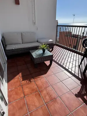 Un balcón o terraza de Vista Azul Suites con terraza al lado del mar