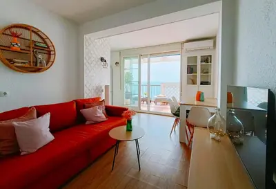 Zona de estar de Vista Azul Suites con terraza al lado del mar