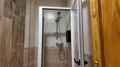 Un baño de Apartalux Aura Essence