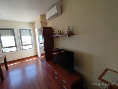 Una televisión o centro de entretenimiento en apartamento albaida