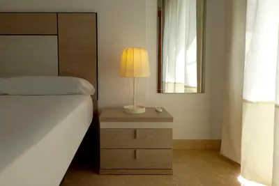 Cama o camas de una habitación en Apartamentos Villa Azul