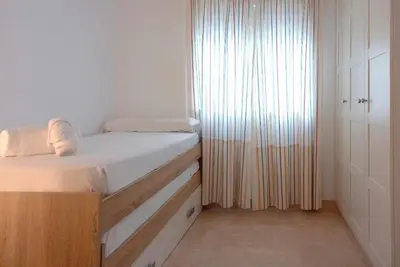 Cama o camas de una habitación en Apartamentos Villa Azul