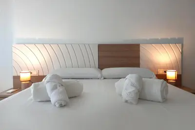 Cama o camas de una habitación en Apartamentos Villa Azul