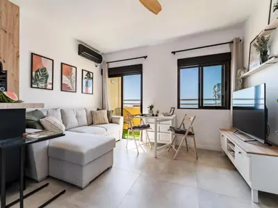 Una televisión o centro de entretenimiento en Studio in Aguadulce with Sea Views & Pool