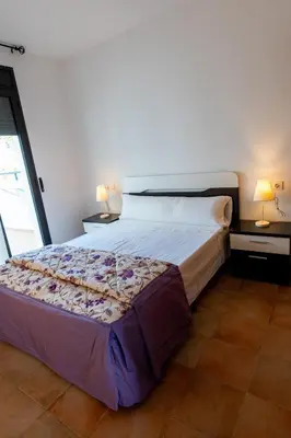 Cama o camas de una habitación en Villa de 4 dormitorios en el Resort Playa Macenas