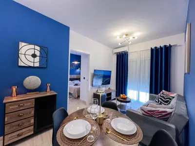 Cama o camas de una habitación en Roquetas Coastal Escape