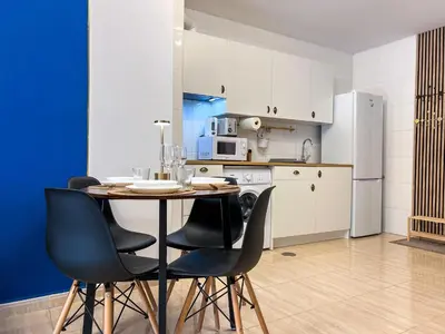 Una cocina o zona de cocina en Roquetas Coastal Escape