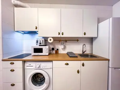 Una cocina o zona de cocina en Roquetas Coastal Escape